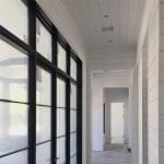 Shiplap Hallway with Black Windows