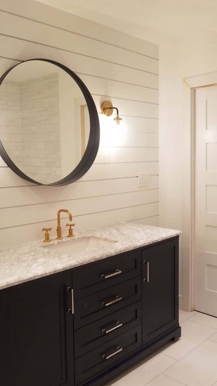 Marble and Brass Sink vanity on Black Vertical Shiplap Wall - Transitional  - Bathroom