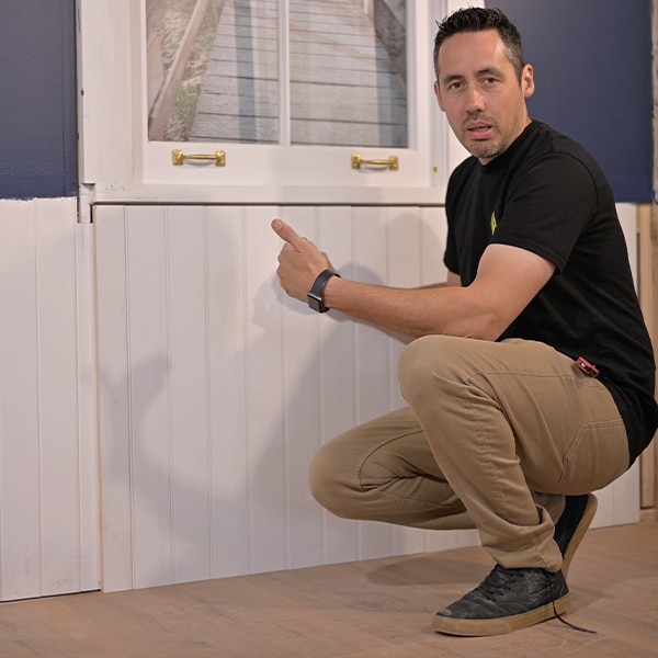 Richard McMurray explaining the art of Wainscoting Installation