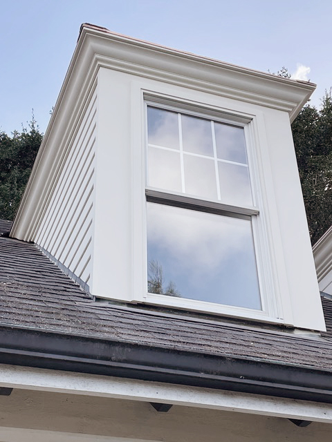 Detail photo of a well designed dormer of the home