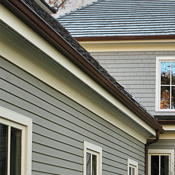 Band boards and rake boards on house exterior trim