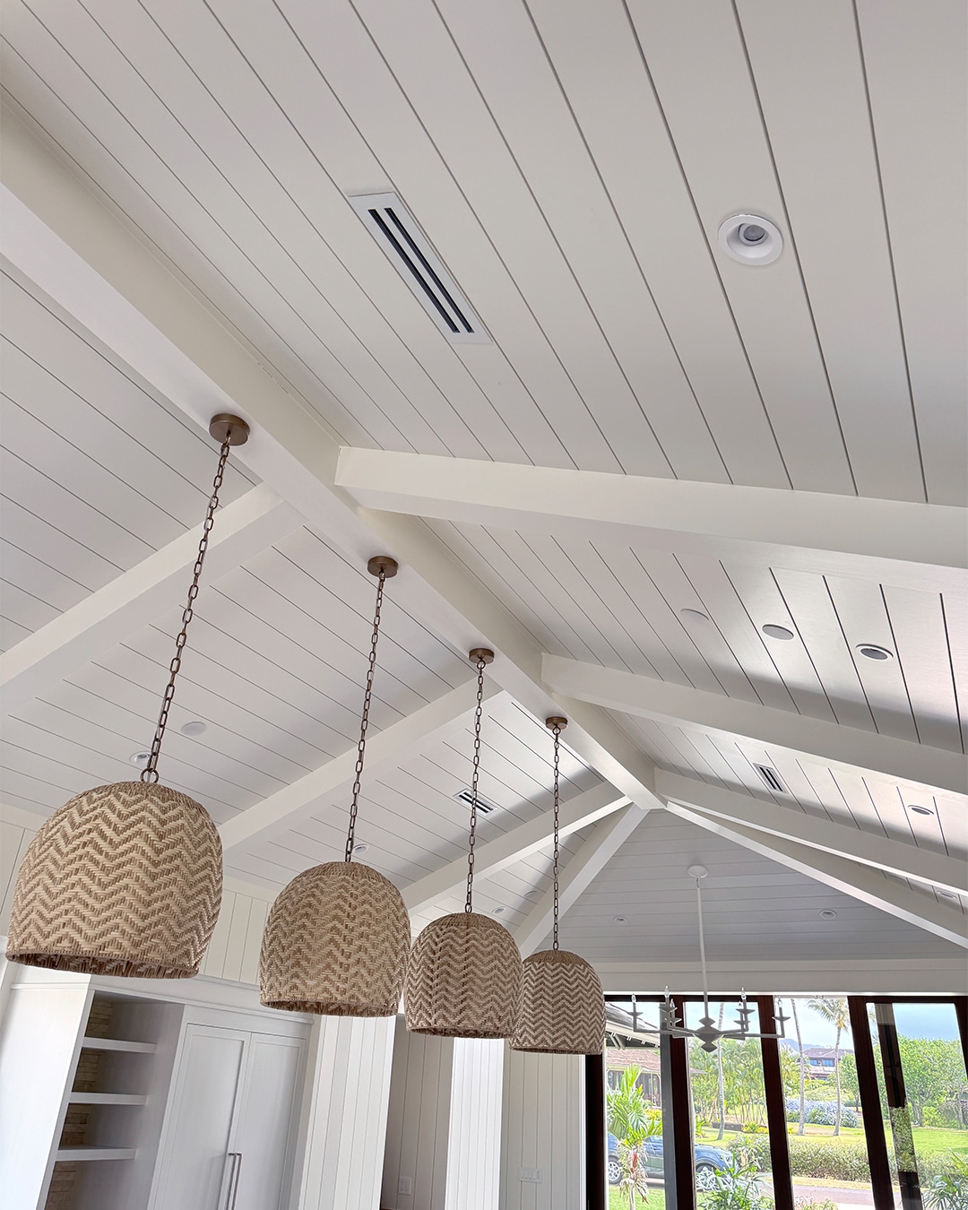 Vaulted WindsorONE shiplap ceiling with beams and hanging woven lights