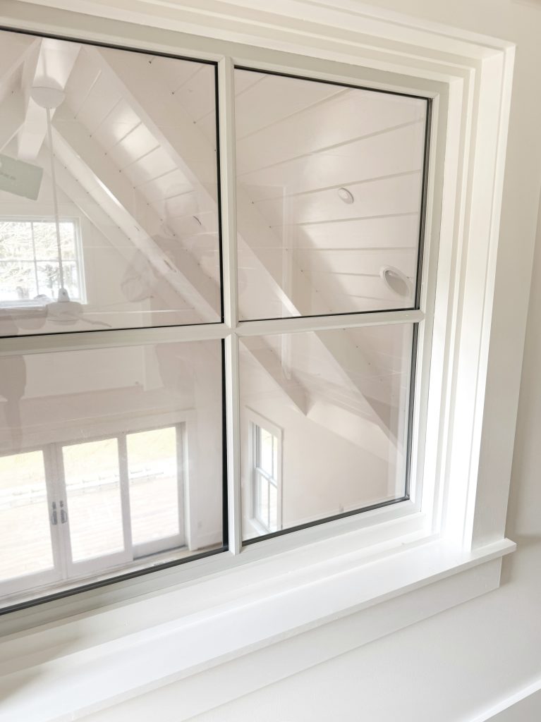 Interior window, an upper room looking out onto the great room ceiling