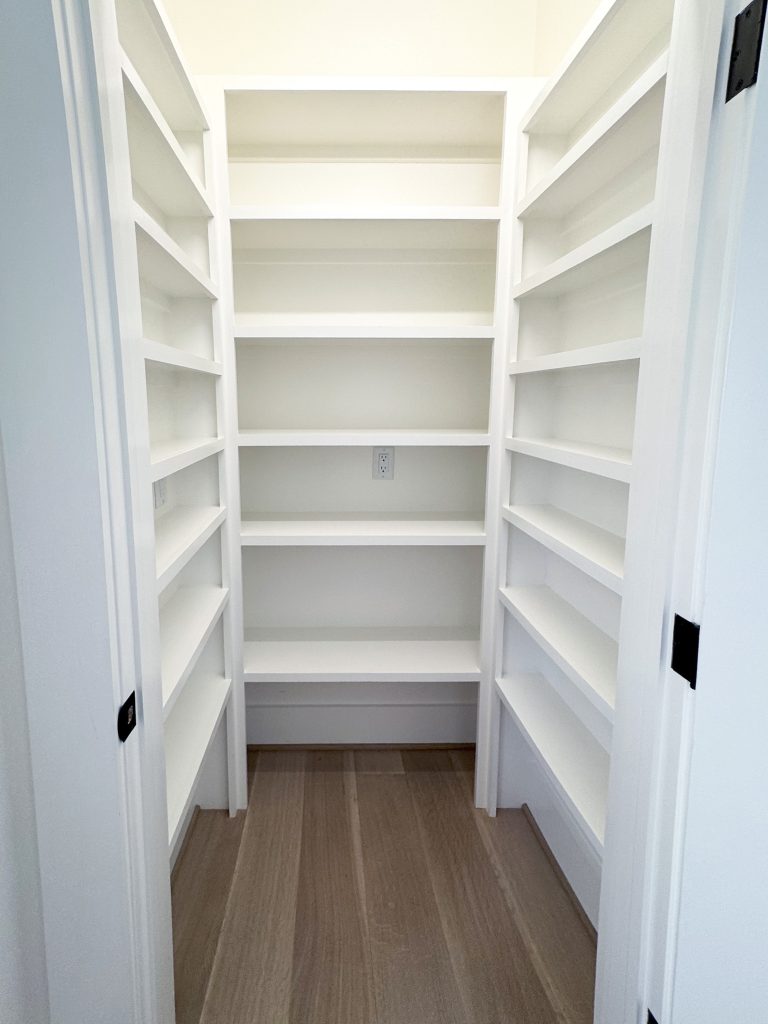 Custom walk in pantry closet with lots of shelves