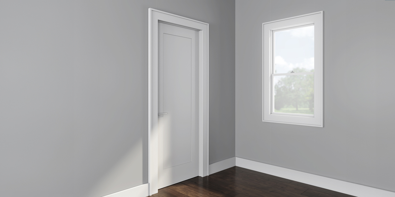 gray room with white picture frames moldings made with flat stock profiles