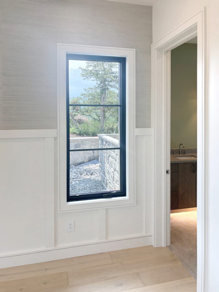 Detail of window and board and batten wainscoting & door jamb